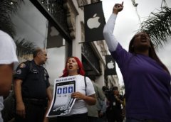 苹果iPhone6首发日：劫匪、抗议不消停